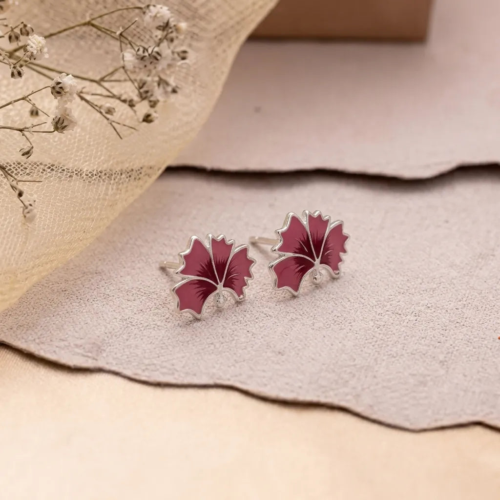 Marvel Silver blue and green enamel leaf stud earrings for women and girls featuring a silver-plated finish with a nature-inspired minimalist design.