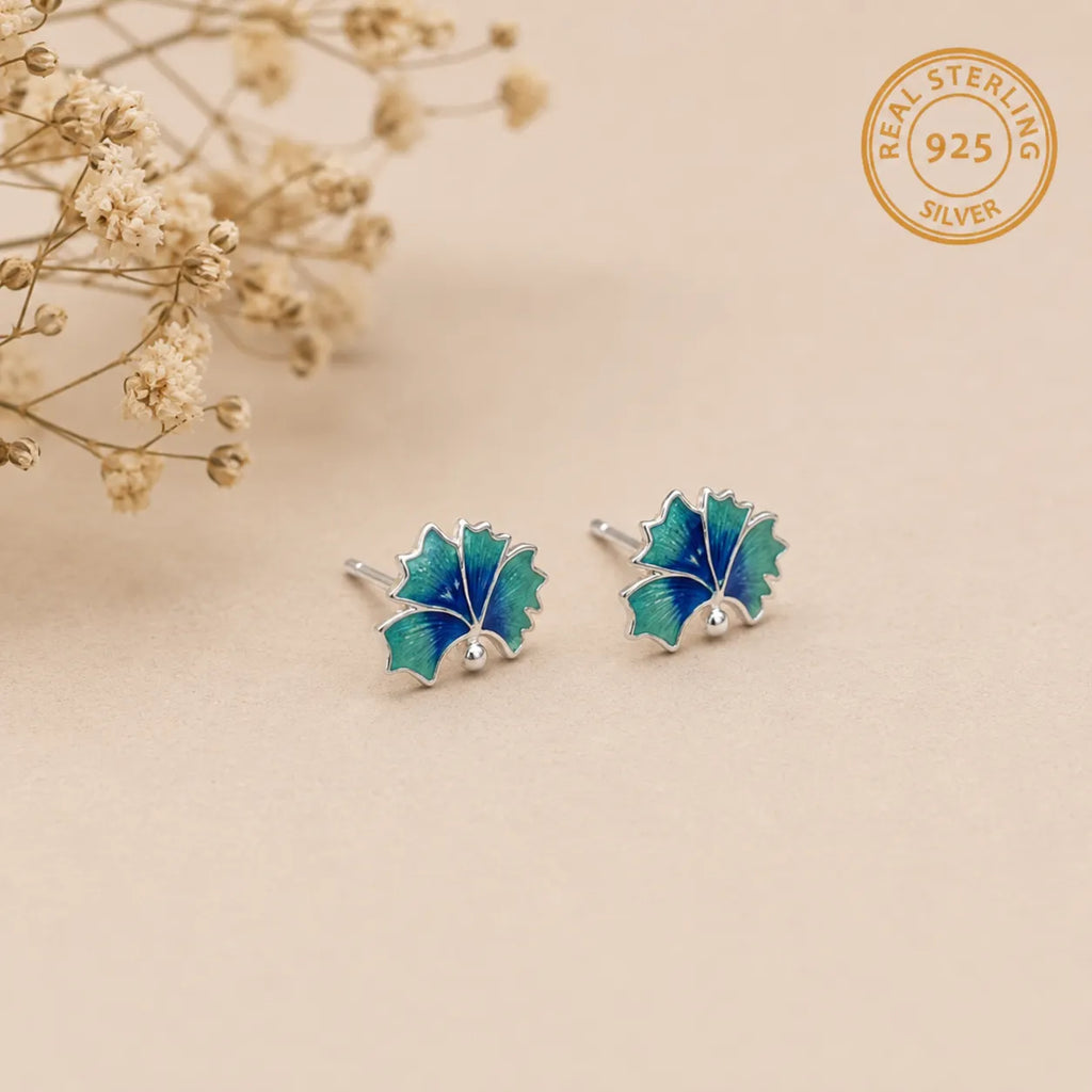 Marvel Silver blue and green enamel leaf stud earrings for women and girls featuring a silver-plated finish with a nature-inspired minimalist design.