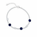 Marvel Silver 925 sterling silver tennis bracelet featuring sparkling blue sapphire-inspired Cubic Zirconia stones with brilliant white AAA Cubic Zirconia accents, rhodium-plated finish, adjustable extension chain, elegant bracelet for women and girls suitable for daily wear, parties, weddings, anniversaries, and gifting.