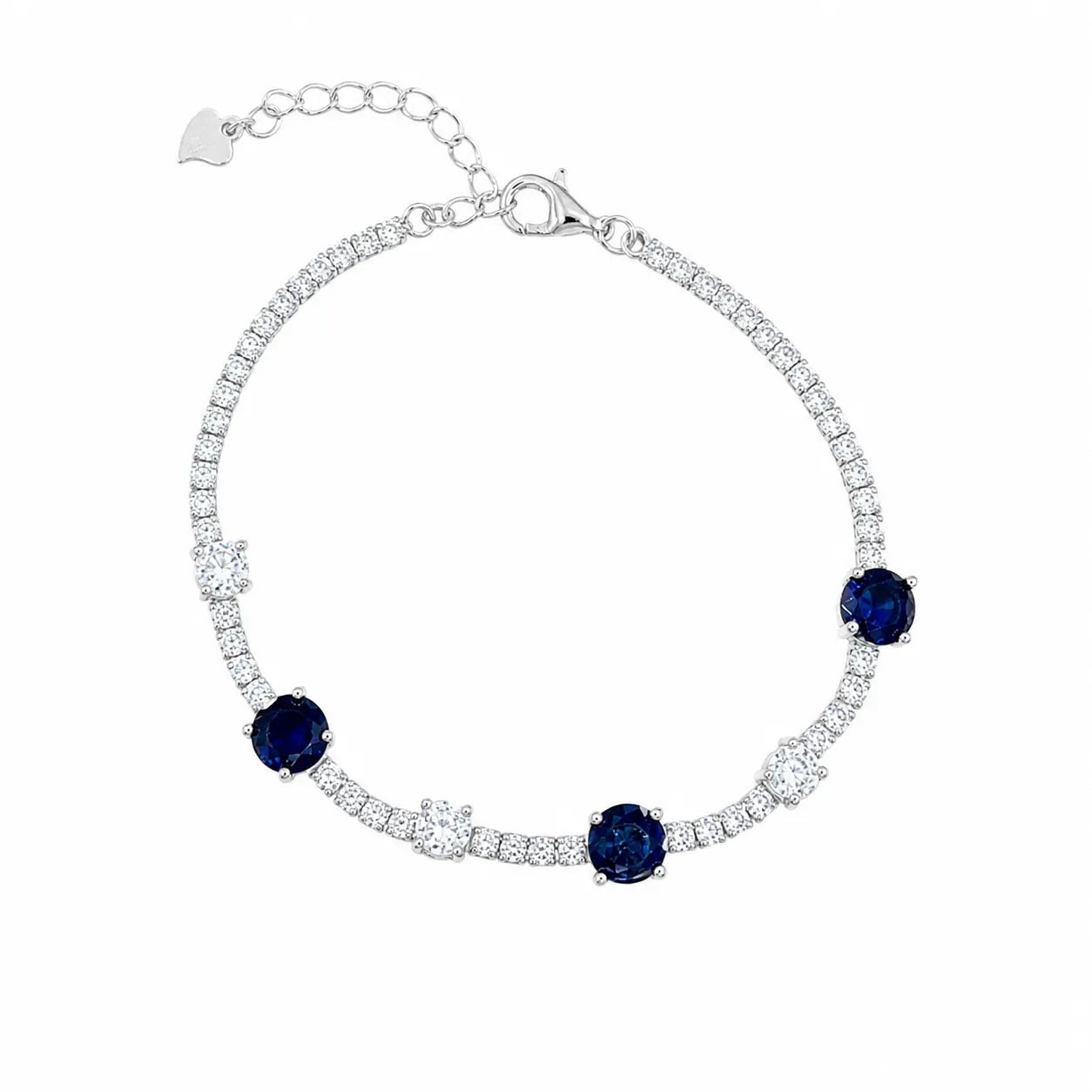 Marvel Silver 925 sterling silver tennis bracelet featuring sparkling blue sapphire-inspired Cubic Zirconia stones with brilliant white AAA Cubic Zirconia accents, rhodium-plated finish, adjustable extension chain, elegant bracelet for women and girls suitable for daily wear, parties, weddings, anniversaries, and gifting.