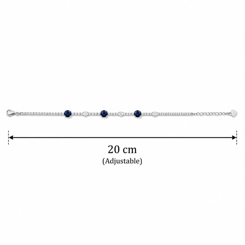Marvel Silver 925 sterling silver tennis bracelet featuring sparkling blue sapphire-inspired Cubic Zirconia stones with brilliant white AAA Cubic Zirconia accents, rhodium-plated finish, adjustable extension chain, elegant bracelet for women and girls suitable for daily wear, parties, weddings, anniversaries, and gifting.
