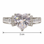Marvel Silver Bow Accent Heart Crystal Silver Ring for Girls and Women Featuring a Large Sparkling Heart-Shaped Centre Stone, Crystal-Studded Bow Side Accents and Elegant Silver Band