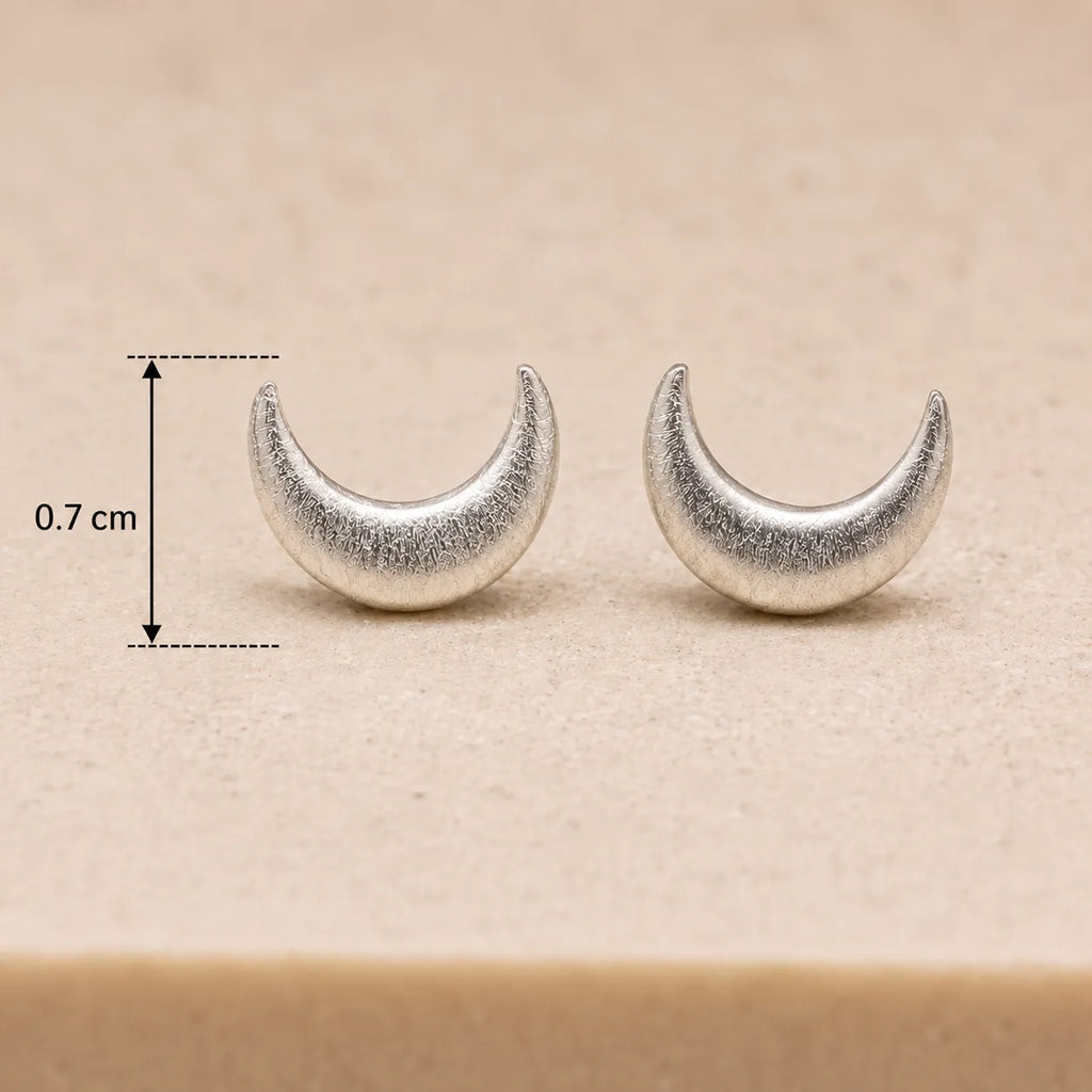 Marvel Silver crescent moon stud earrings for women and girls featuring a minimalist silver-plated celestial moon design with a polished finish and secure stud backing.
