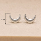 Marvel Silver crescent moon stud earrings for women and girls featuring a minimalist silver-plated celestial moon design with a polished finish and secure stud backing.
