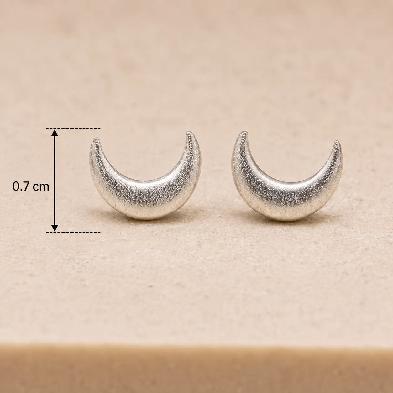 Marvel Silver crescent moon stud earrings for women and girls featuring a minimalist silver-plated celestial moon design with a polished finish and secure stud backing.