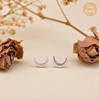 Marvel Silver crescent moon stud earrings for women and girls featuring a minimalist silver-plated celestial moon design with a polished finish and secure stud backing.