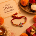 Cute Bal Ganesh Kids Rakhi with Handmade Orange & Red Thread for Raksha Bandhan