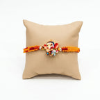 Cute Bal Ganesh Kids Rakhi with Handmade Orange & Red Thread for Raksha Bandhan