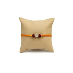 Marvel Silver Double Rudraksha Rakhi featuring two sacred Rudraksha beads, a premium silver center bead, and a saffron-orange thread for Raksha Bandhan celebrations.
