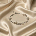 Marvel Silver Elegant Pearl Double-Layer Silver Bracelet for women with white pearl-style beads and delicate layered silver chains