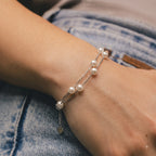 Marvel Silver Elegant Pearl Double-Layer Silver Bracelet for women with white pearl-style beads and delicate layered silver chains