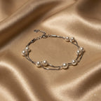 Marvel Silver Elegant Pearl Double-Layer Silver Bracelet for women with white pearl-style beads and delicate layered silver chains