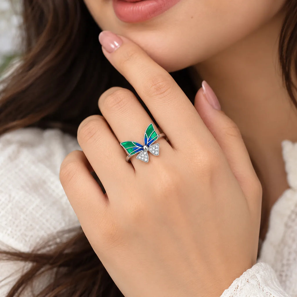 Marvel Silver Emerald Blue Butterfly Crystal Silver Ring for girls with green and blue wings and sparkling white crystal accents