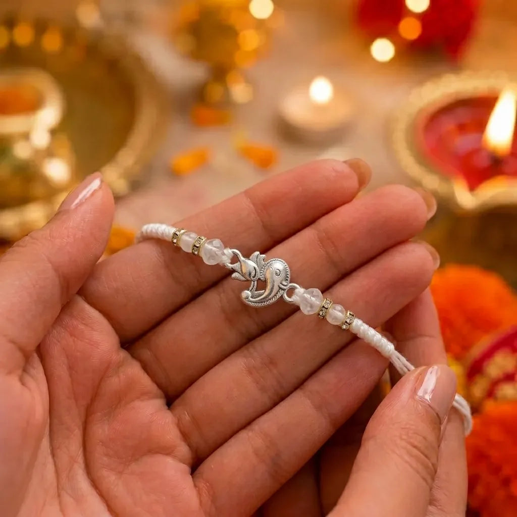 Marvel Silver Ganesh Silver Rakhi with White Crystal Beads, White Pearl Beads and Premium Silver Ganesh-Inspired Charm for Raksha Bandhan