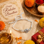 Marvel Silver Ganesh Silver Rakhi with White Crystal Beads, White Pearl Beads and Premium Silver Ganesh-Inspired Charm for Raksha Bandhan