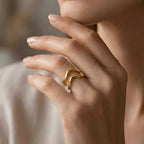 Marvel Silver gold-plated abstract adjustable ring for women and girls featuring a modern wave-inspired open design with a premium polished finish.