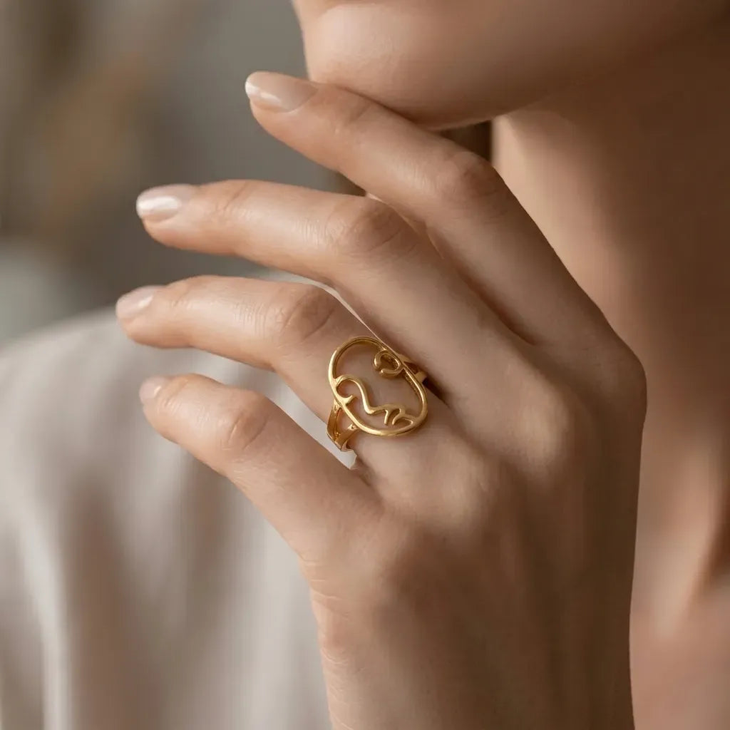 Marvel Silver gold-plated abstract face adjustable ring for women and girls featuring a modern line art face design with a polished finish and elegant contemporary styling.