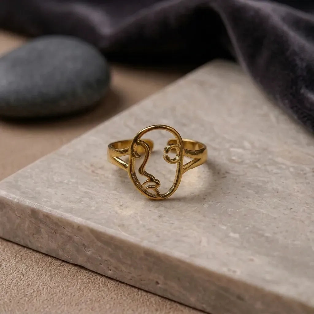 Marvel Silver gold-plated abstract face adjustable ring for women and girls featuring a modern line art face design with a polished finish and elegant contemporary styling.