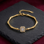 Marvel Silver gold-plated bamboo link bracelet with an emerald-cut crystal centerpiece and adjustable chain for women and girls, featuring a premium polished finish suitable for daily wear, parties, weddings, and festive occasions.