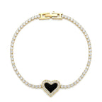 Marvel Silver gold-plated tennis bracelet featuring sparkling crystal stones, a black heart centerpiece with crystal detailing, and a secure box clasp, designed for women and girls for parties, weddings, festive occasions, daily wear, and gifting.