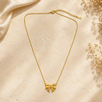 Marvel Silver gold-plated bow chain pendant for women and girls featuring an elegant ribbon bow design with a delicate gold chain and premium polished finish.
