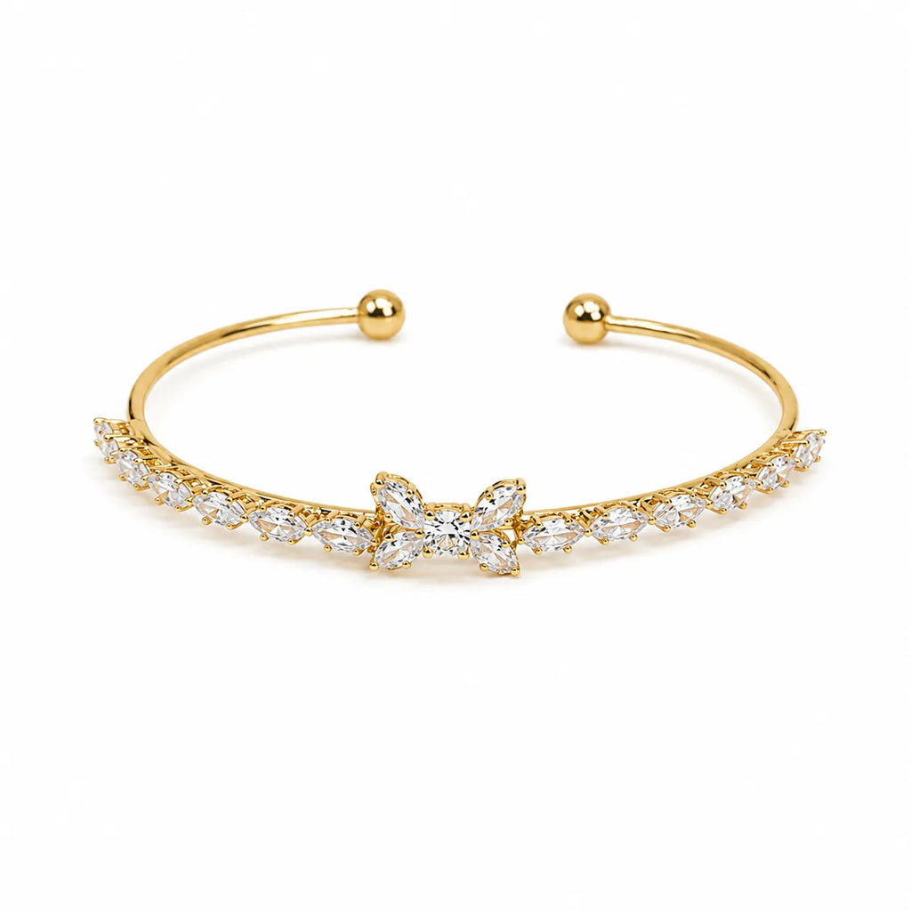 Marvel Silver gold-plated open cuff kada featuring sparkling marquise-cut cubic zirconia stones with an elegant floral centerpiece, designed for women and girls, perfect for weddings, parties, festive occasions, daily wear, and gifting.