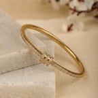 Marvel Silver gold-plated slim bangle kada featuring sparkling Cubic Zirconia stone detailing and an elegant triple-ring centerpiece with a secure hinged clasp, designed for women and girls, perfect for weddings, parties, office wear, festive occasions, daily wear, and gifting.