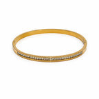 Marvel Silver gold-plated slim crystal kada bracelet for women and girls featuring a sleek minimalist design with sparkling crystal stone detailing and a secure hinged closure, ideal for daily wear, office, parties, weddings, festive occasions, and gifting.