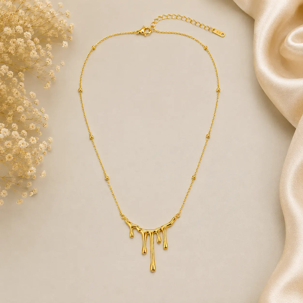 Marvel Silver gold-plated drip design chain pendant for women and girls featuring a modern molten gold pendant on an elegant beaded chain with a polished high-shine finish.