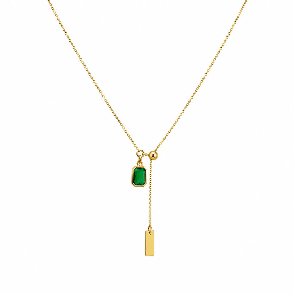 Marvel Silver gold-plated emerald green stone chain pendant for women and girls featuring an adjustable lariat chain with a rectangular green crystal charm and elegant gold bar drop.