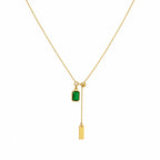 Marvel Silver gold-plated emerald green stone chain pendant for women and girls featuring an adjustable lariat chain with a rectangular green crystal charm and elegant gold bar drop.