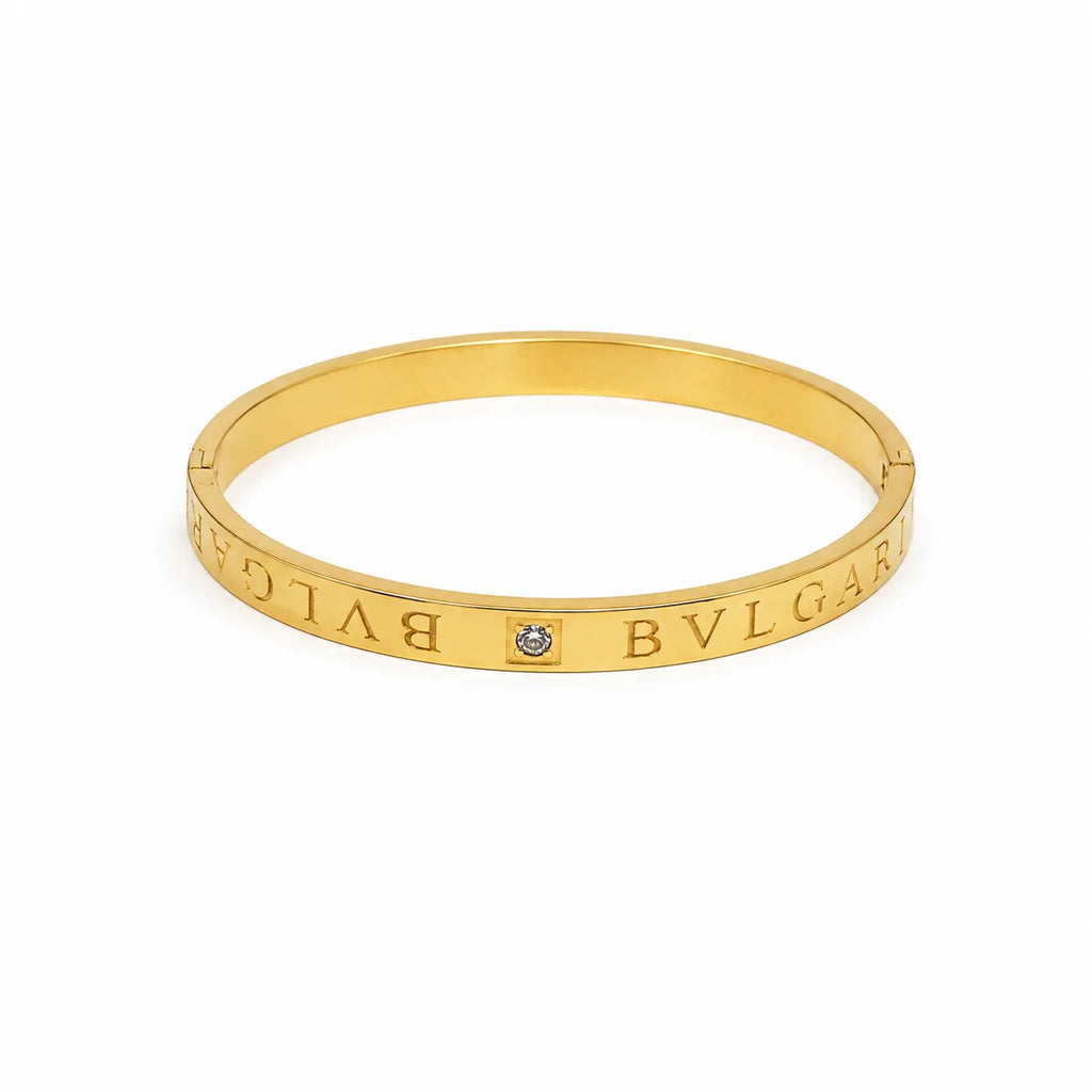 Marvel Silver gold-plated engraved crystal bangle kada featuring a minimalist design with a sparkling center crystal and secure hinged lock, perfect for women and girls for daily wear, office wear, parties, weddings, festive occasions, and gifting.