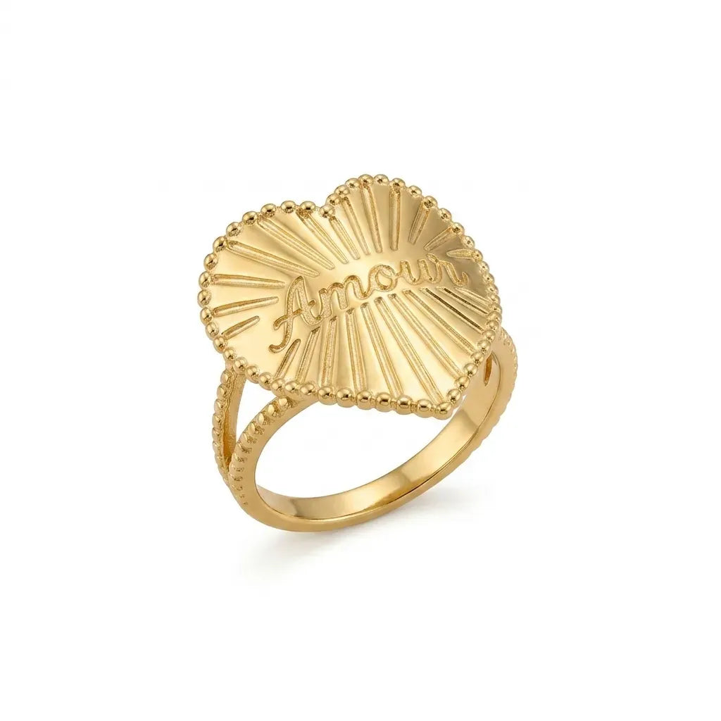 Marvel Silver gold-plated heart-shaped Amour statement ring for women and girls featuring an engraved love design with sunburst detailing and a premium polished finish, perfect for everyday wear and special occasions.