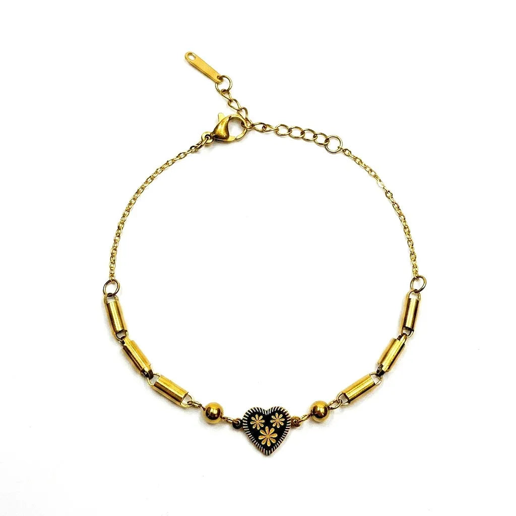 Marvel Silver gold-plated bracelet featuring a floral heart charm centerpiece with elegant gold-tone bar links and an adjustable chain, designed for women and girls for everyday wear, parties, weddings, festive occasions, and gifting.