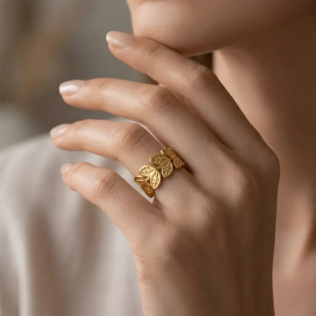 Marvel Silver gold-plated adjustable leaf design ring for women and girls featuring intricate cutwork leaf motifs with a premium polished finish, ideal for everyday, festive, and party wear.