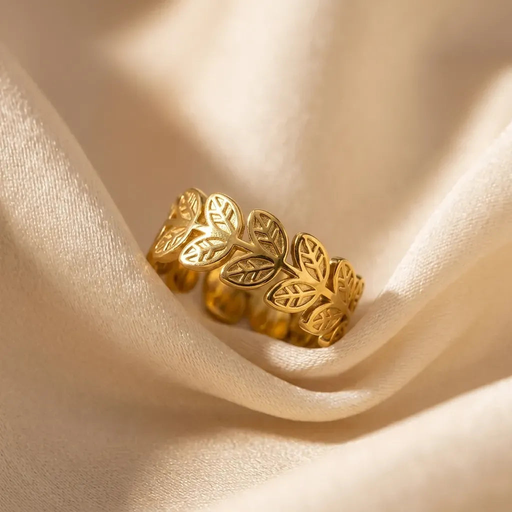 Marvel Silver gold-plated adjustable leaf design ring for women and girls featuring intricate cutwork leaf motifs with a premium polished finish, ideal for everyday, festive, and party wear.