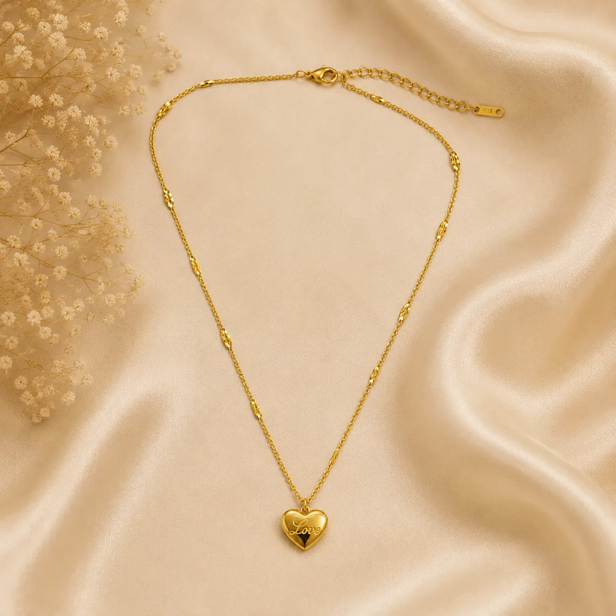 Marvel Silver gold-plated Love heart chain pendant for women and girls featuring a polished heart pendant with elegant decorative chain accents.