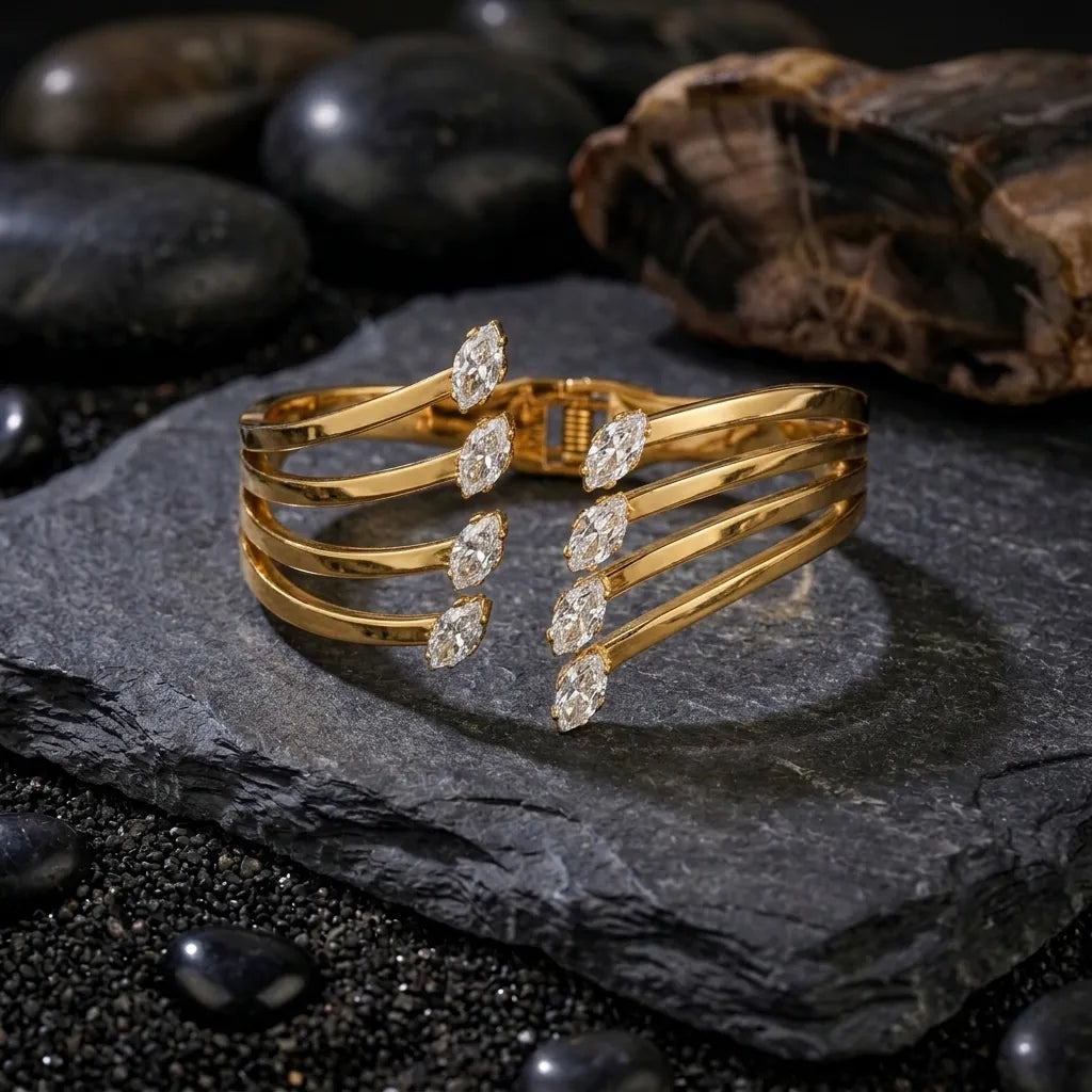 Marvel Silver gold-plated multi-layer cuff kada featuring sparkling marquise-cut Cubic Zirconia stones and a secure hinged closure, designed for women and girls, ideal for weddings, parties, festive occasions, office wear, daily wear, and gifting.
