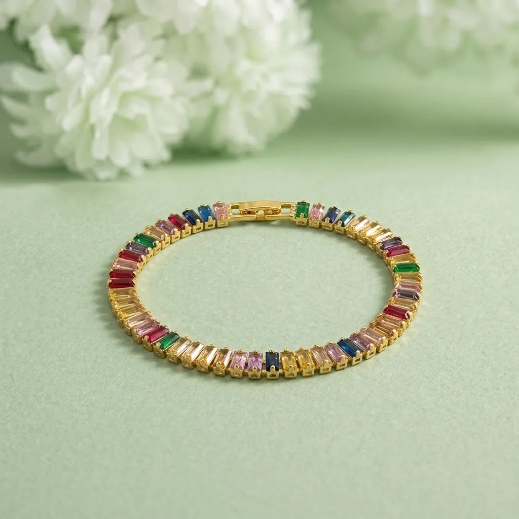 Marvel Silver gold-plated multicolor baguette tennis bracelet for women and girls featuring sparkling colourful CZ stones, a secure box clasp, and a premium polished finish, perfect for everyday wear, parties, weddings, and special occasions.
