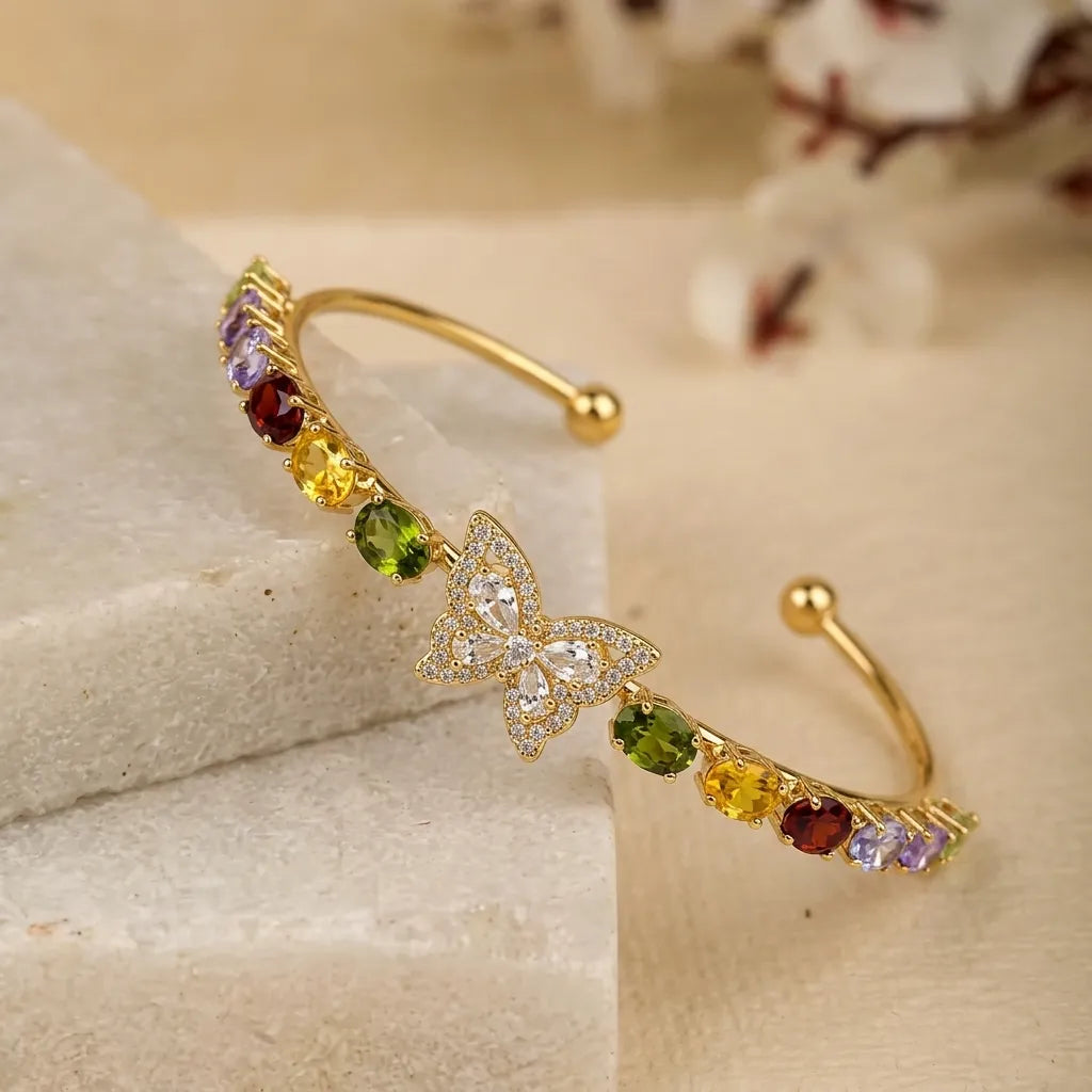 Marvel Silver gold-plated open cuff kada featuring a sparkling Cubic Zirconia butterfly centerpiece with vibrant multicolor crystal accents, designed for women and girls, perfect for weddings, parties, festive occasions, office wear, daily wear, and gifting.