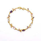 Marvel Silver gold-plated multicolor crystal vine bracelet featuring purple, pink, and white oval and marquise-cut stones with an elegant floral-inspired design for women and girls, ideal for weddings, parties, festive wear, daily styling, and gifting.