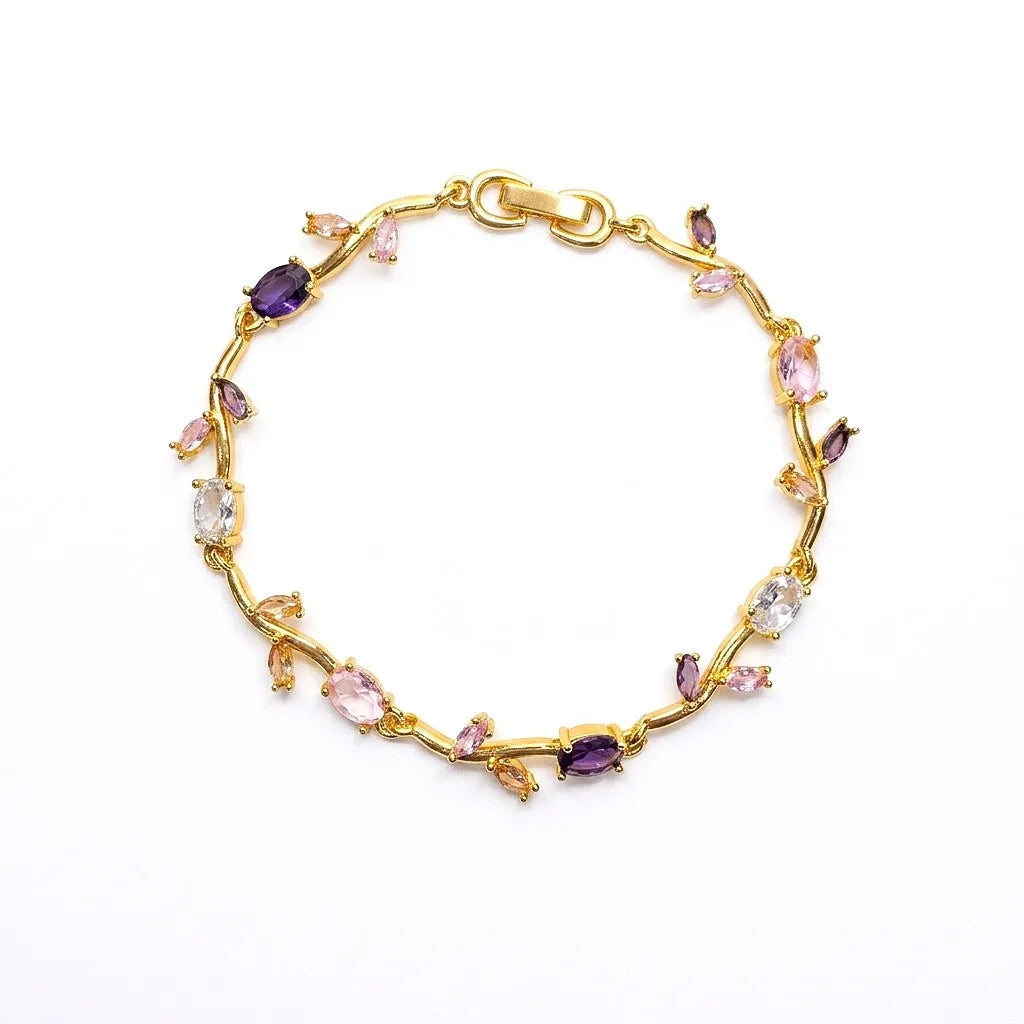Marvel Silver gold-plated multicolor crystal vine bracelet featuring purple, pink, and white oval and marquise-cut stones with an elegant floral-inspired design for women and girls, ideal for weddings, parties, festive wear, daily styling, and gifting.