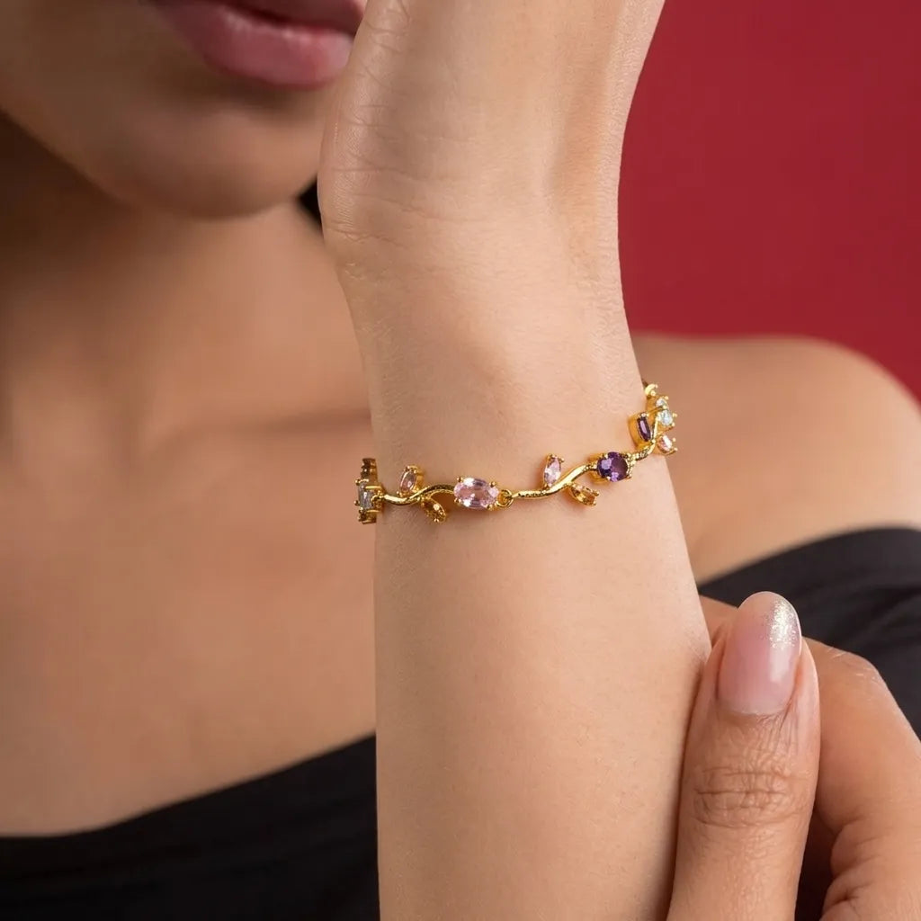 Marvel Silver gold-plated multicolor crystal vine bracelet featuring purple, pink, and white oval and marquise-cut stones with an elegant floral-inspired design for women and girls, ideal for weddings, parties, festive wear, daily styling, and gifting.