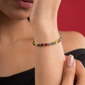 Marvel Silver gold-plated multicolor marquise crystal bracelet featuring colourful gemstone-inspired crystals in green, blue, red, purple, yellow, pink, and champagne shades, designed for women and girls, perfect for parties, weddings, festive occasions, daily wear, and gifting.