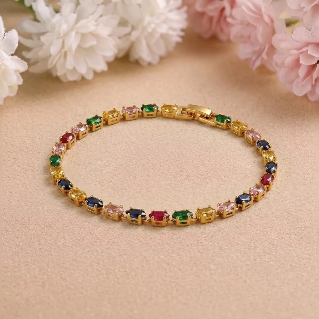 Marvel Silver gold-plated multicolor marquise crystal bracelet featuring colourful gemstone-inspired crystals in green, blue, red, purple, yellow, pink, and champagne shades, designed for women and girls, perfect for parties, weddings, festive occasions, daily wear, and gifting.