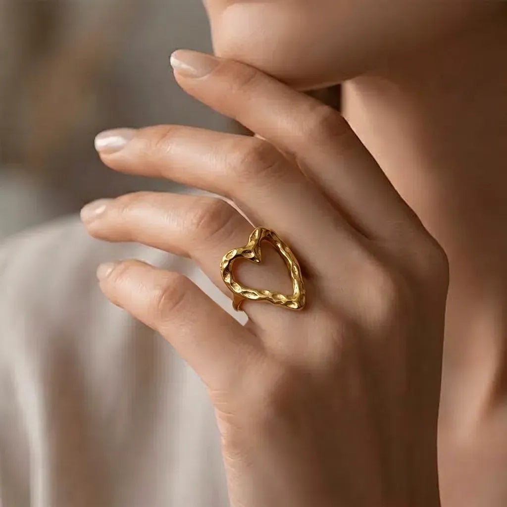 Marvel Silver gold-plated open heart adjustable ring for women and girls featuring a textured heart-shaped design with a polished finish and an elegant adjustable band.