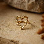 Marvel Silver gold-plated open heart adjustable ring for women and girls featuring a textured heart-shaped design with a polished finish and an elegant adjustable band.