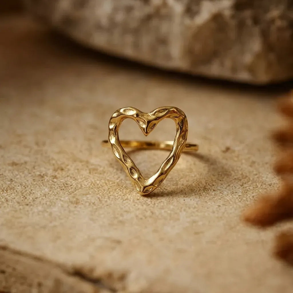 Marvel Silver gold-plated open heart adjustable ring for women and girls featuring a textured heart-shaped design with a polished finish and an elegant adjustable band.