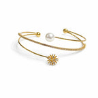Marvel Silver gold-plated open cuff kada featuring sparkling cubic zirconia detailing, a premium pearl accent, and an elegant floral charm, designed for women and girls, perfect for weddings, parties, festive occasions, daily wear, and gifting.