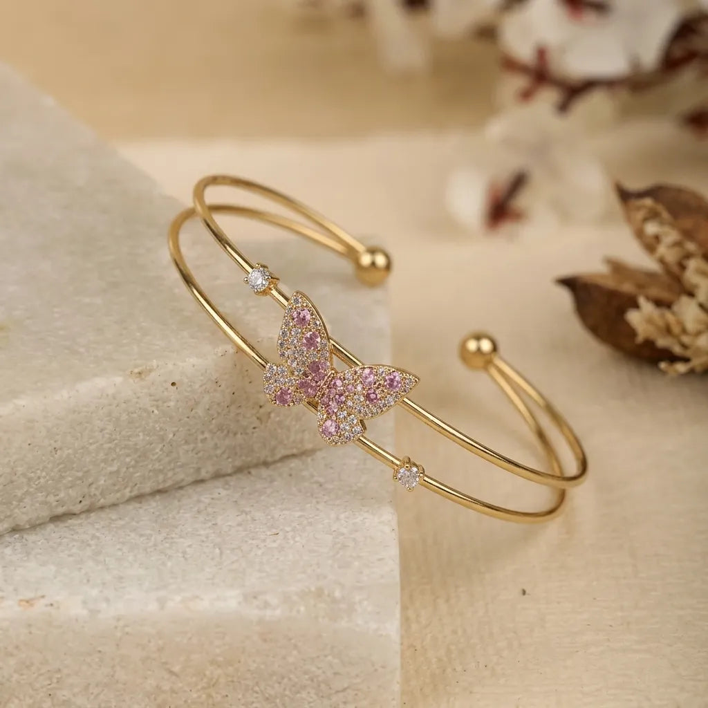 Marvel Silver gold-plated open cuff kada featuring a sparkling pink and white Cubic Zirconia butterfly centerpiece with crystal accents, designed for women and girls, perfect for daily wear, parties, weddings, festive occasions, office wear, and gifting.
